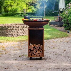 BBQ Plancha Grill Acier Corten Camarada 2.0 – Avec tisonnier et rangement bois Ø70cm